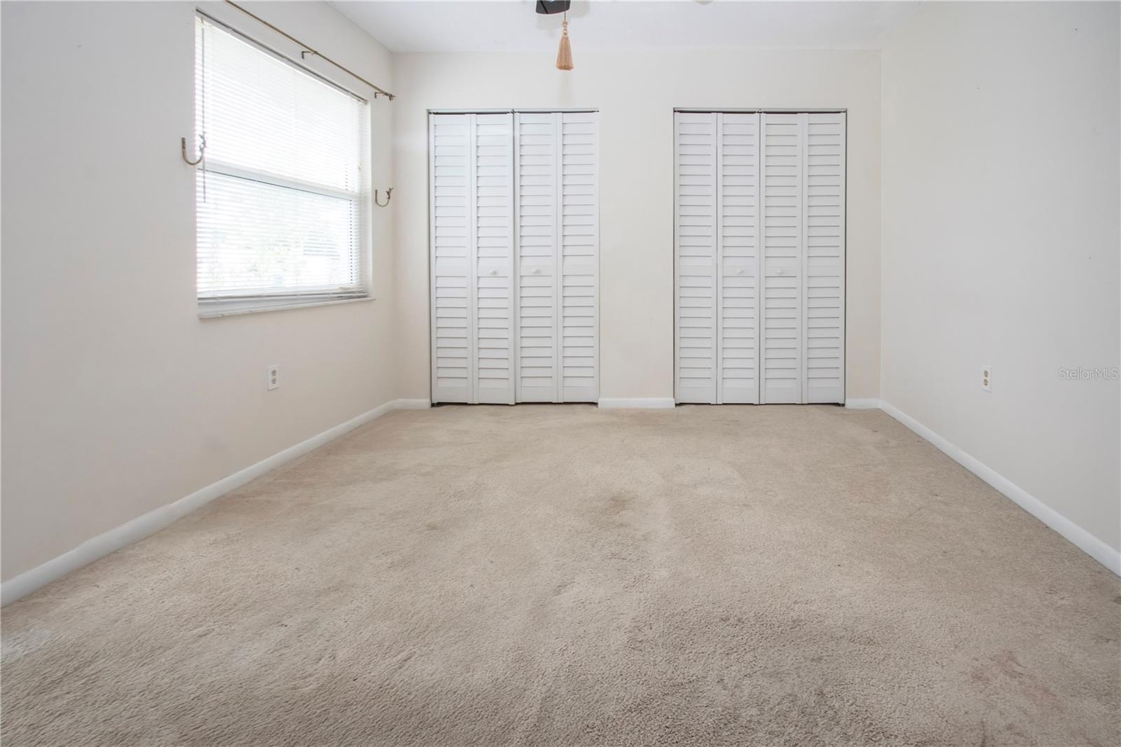 Primary bedroom with double closets