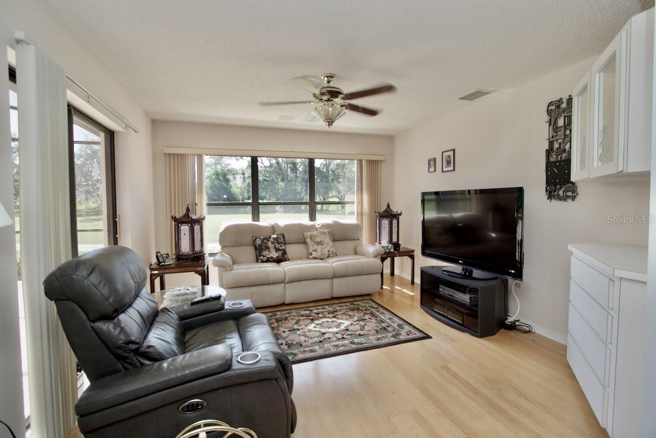 Family Room Just Beyond Breakfast Area With Golf Course View