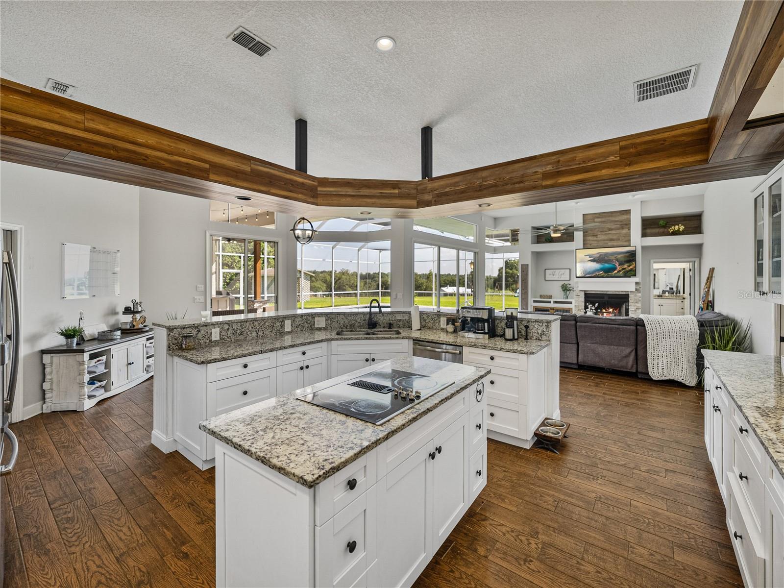 Kitchen with family room in distance