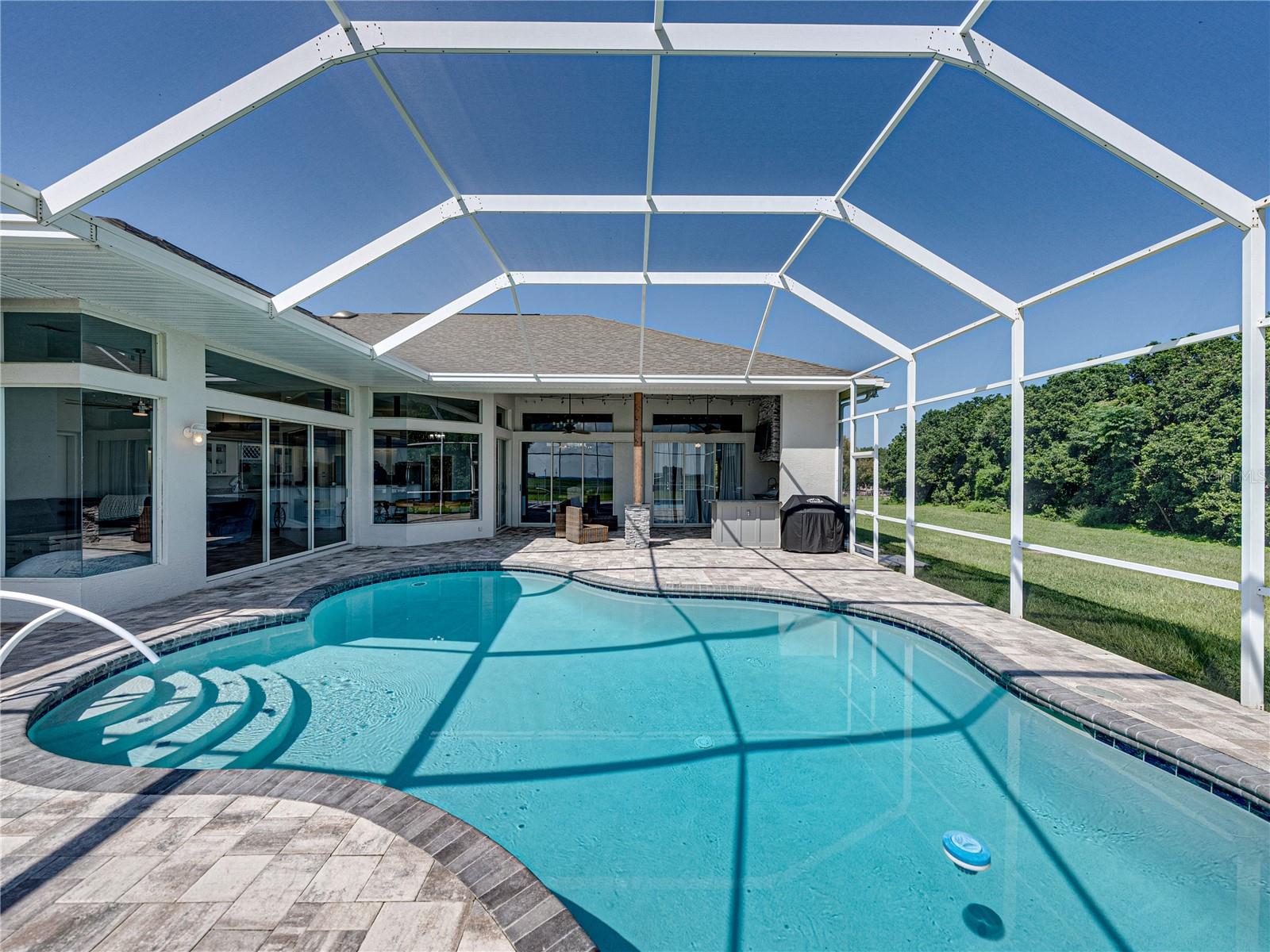 View from pool to outdoor kitchen