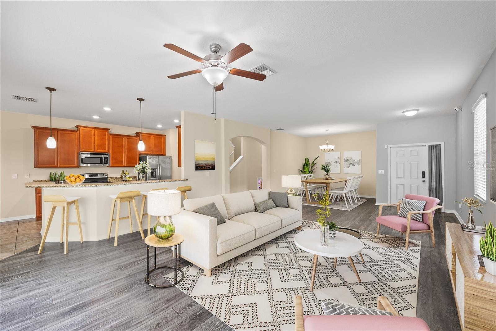 Virtually Staged Livingroom to Formal Dining View