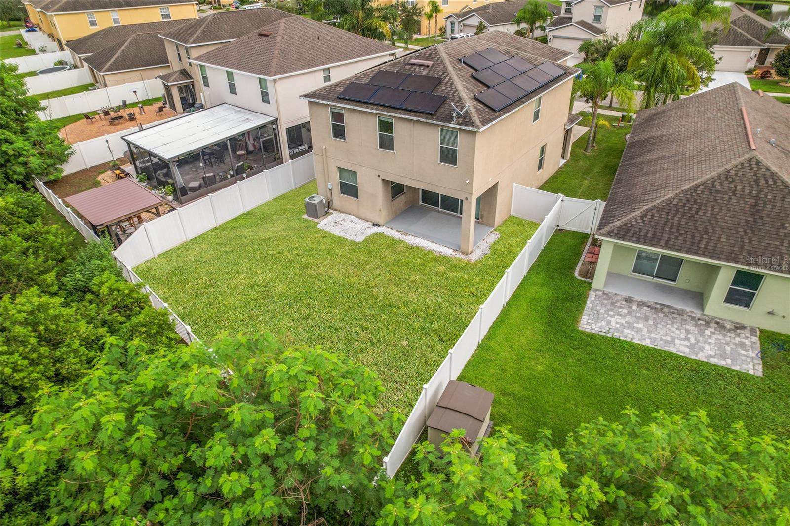 Virtually Staged Aerial View of Back Yard