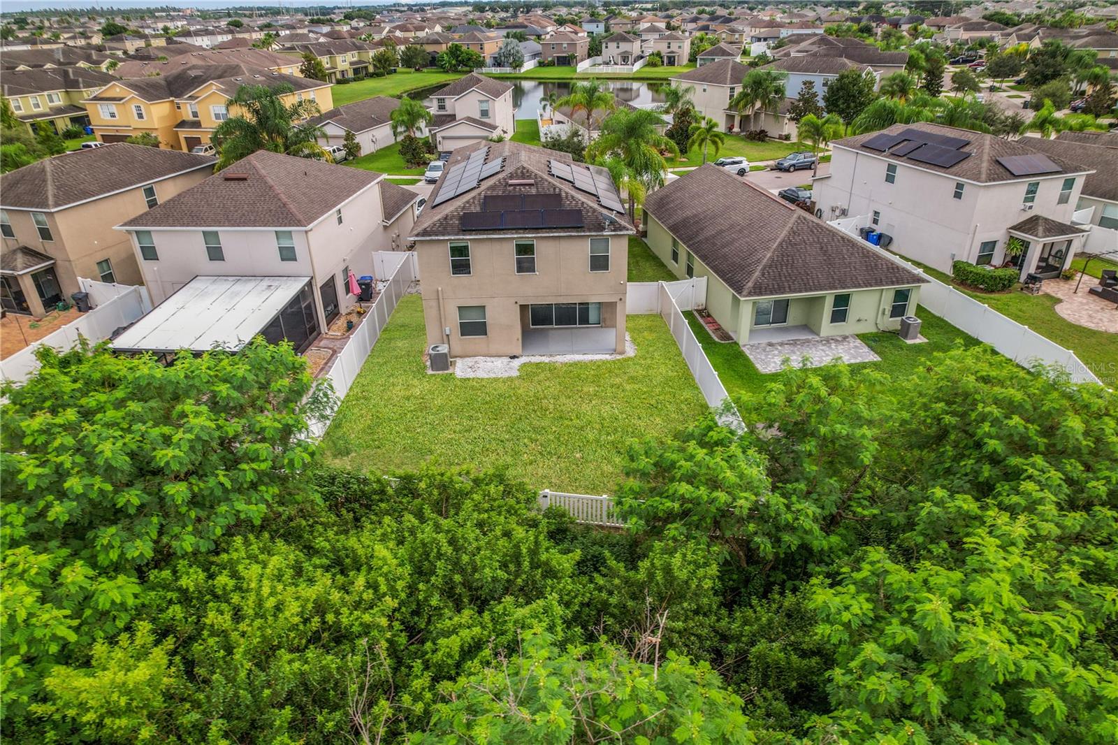 Virtually Staged Aerial View of Back Yard and Nature Preserve