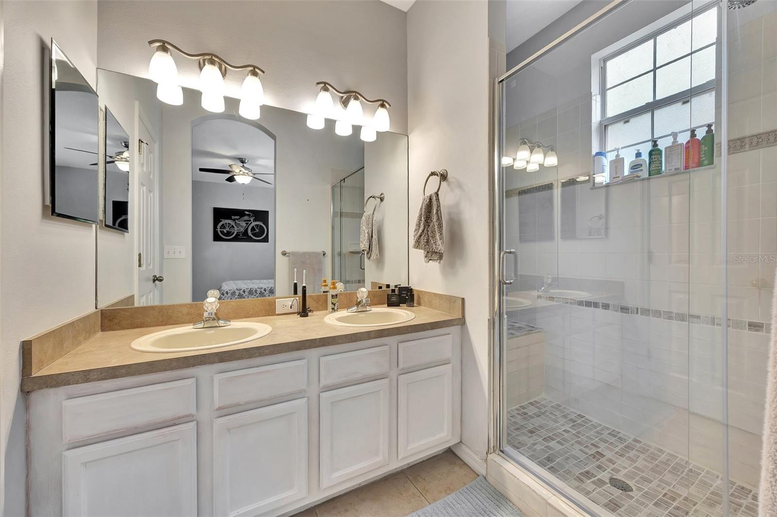 Primary bathroom with dual sinks and walk-in shower!