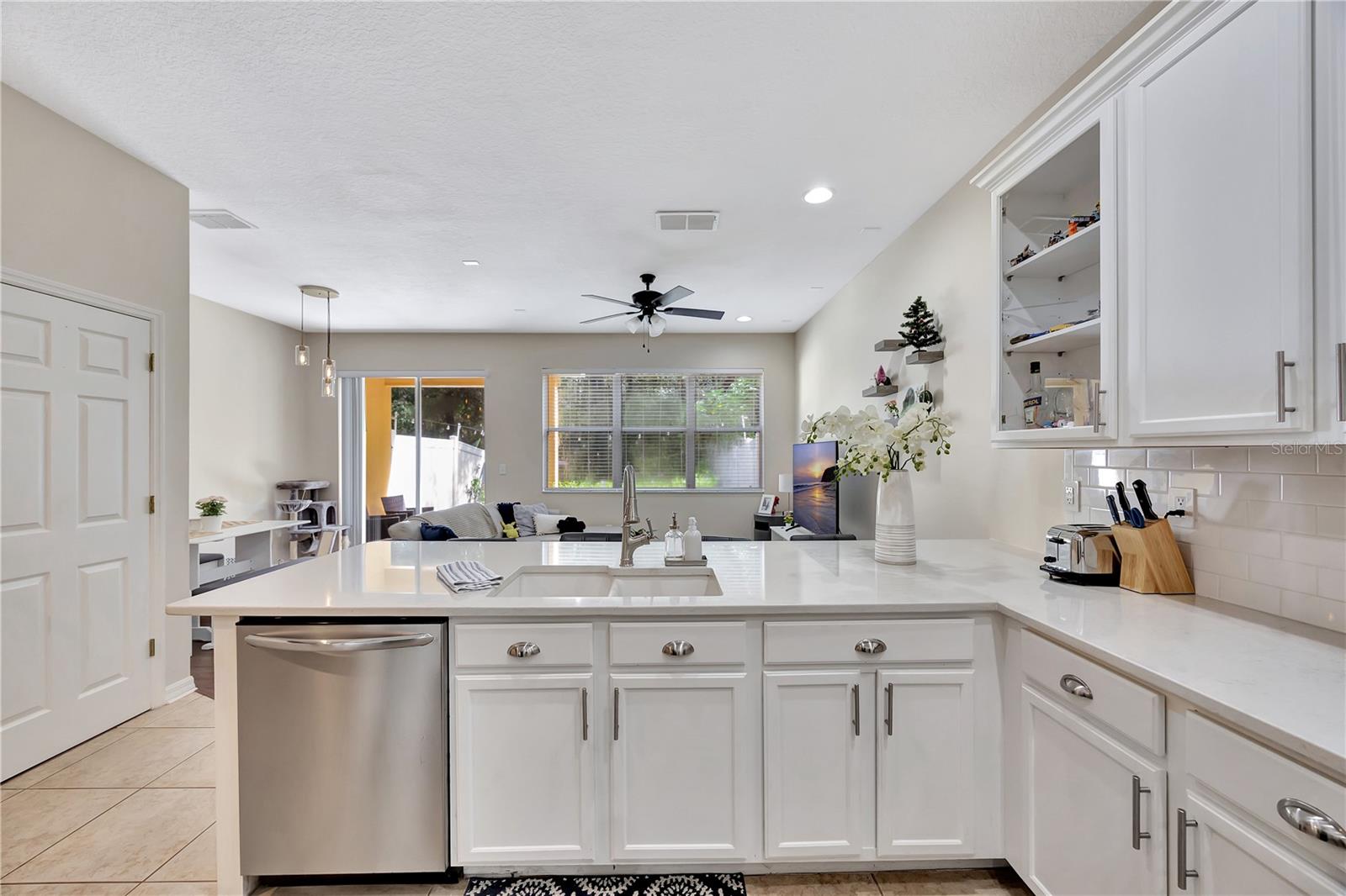 Stone kitchen counter tops with wood cabinets