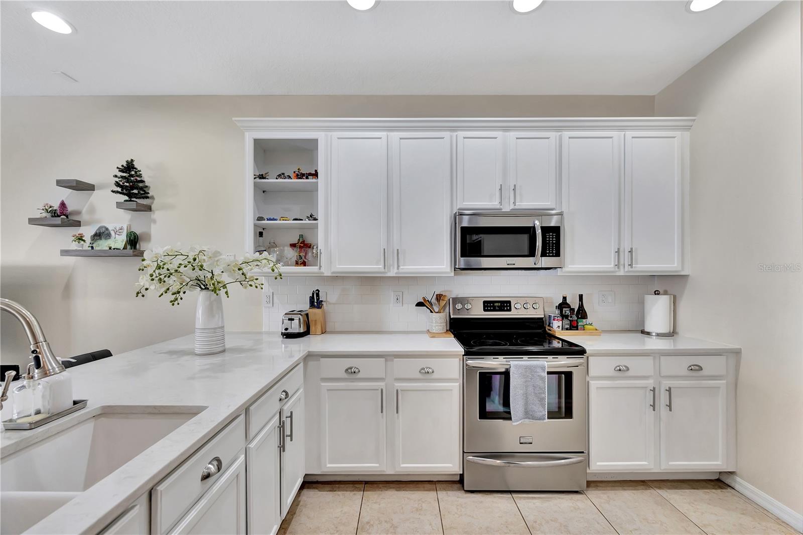 Bright kitchen with stainless steel appliances