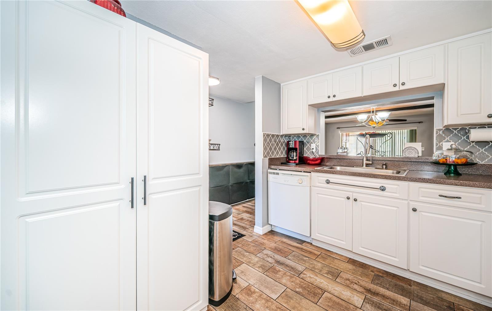 Kitchen pantry, tile floors