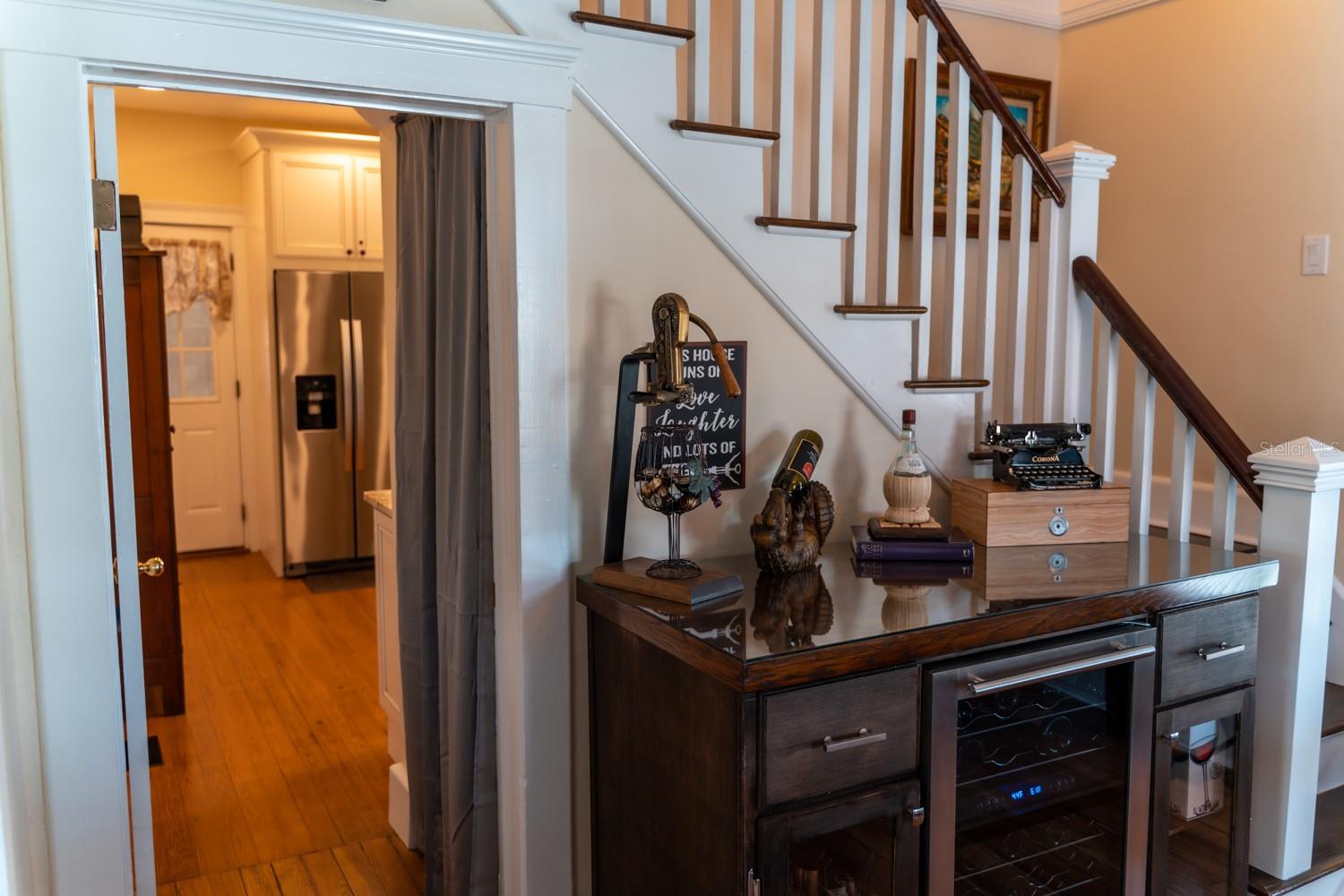 Dining Room, Entrance to Kitchen and Stairs to Second Floor.