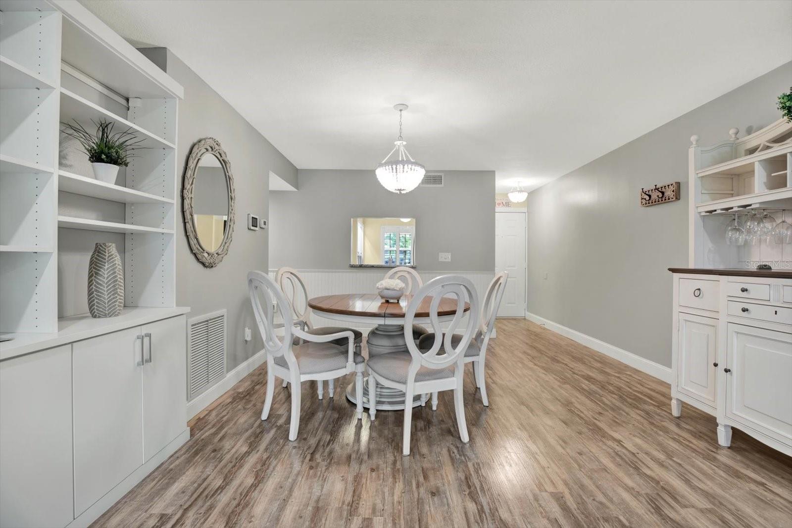 Built ins between living and dining space