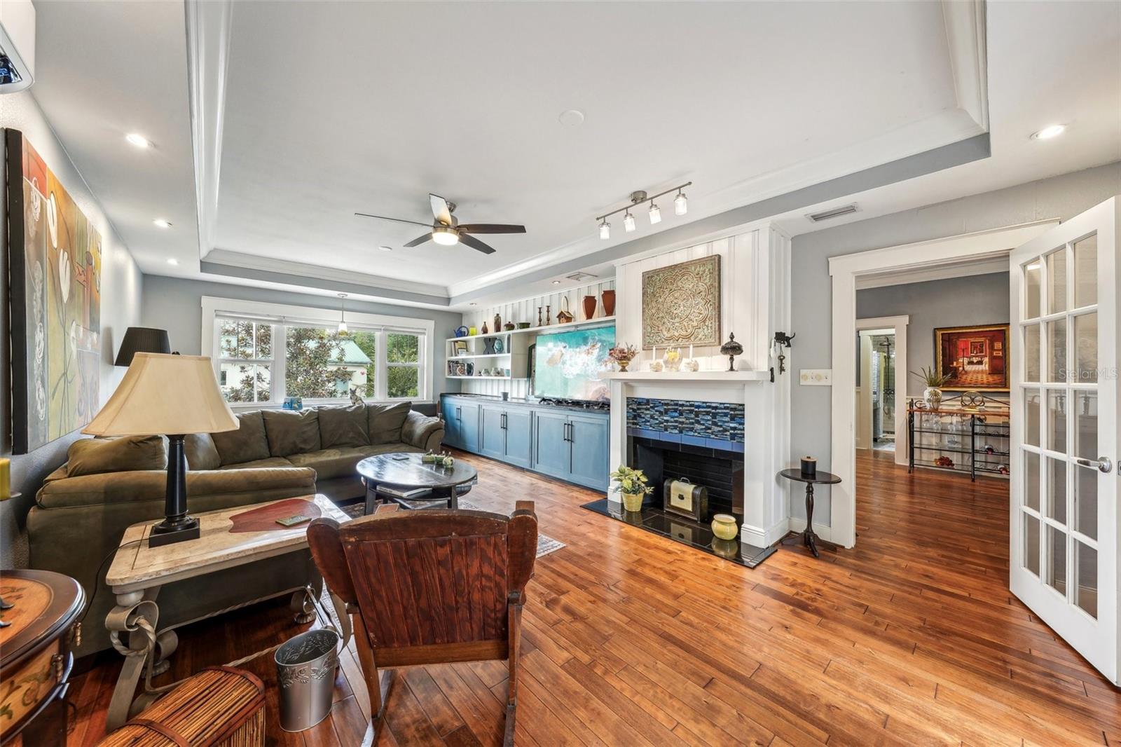 decorative non-working fireplace/built-ins and so much character in this family room