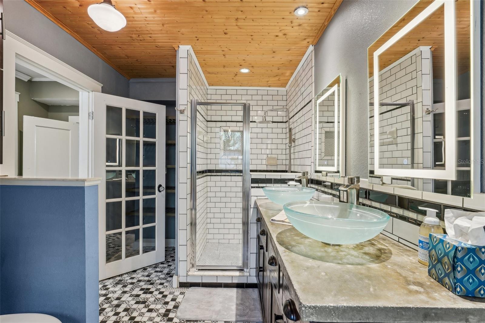 Primary bath with separate walk in shower and soaker tub