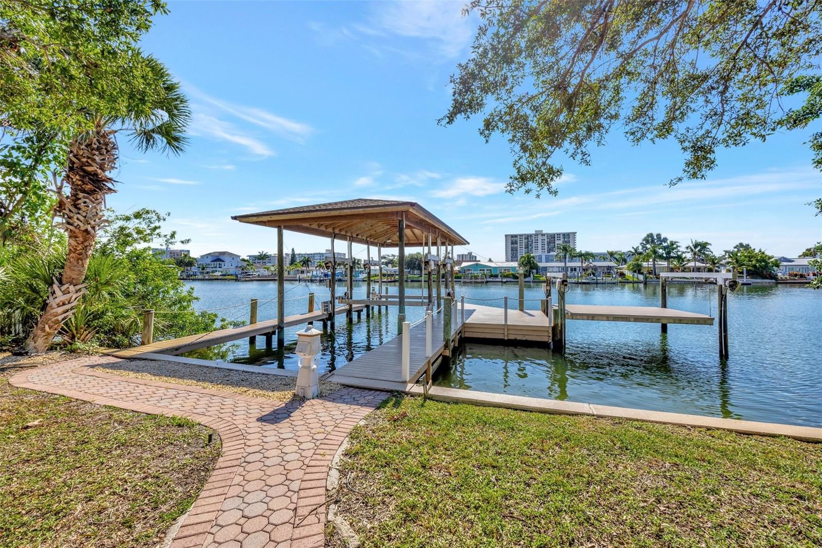 Follow the beautiful walkway from your new home to the boat dock