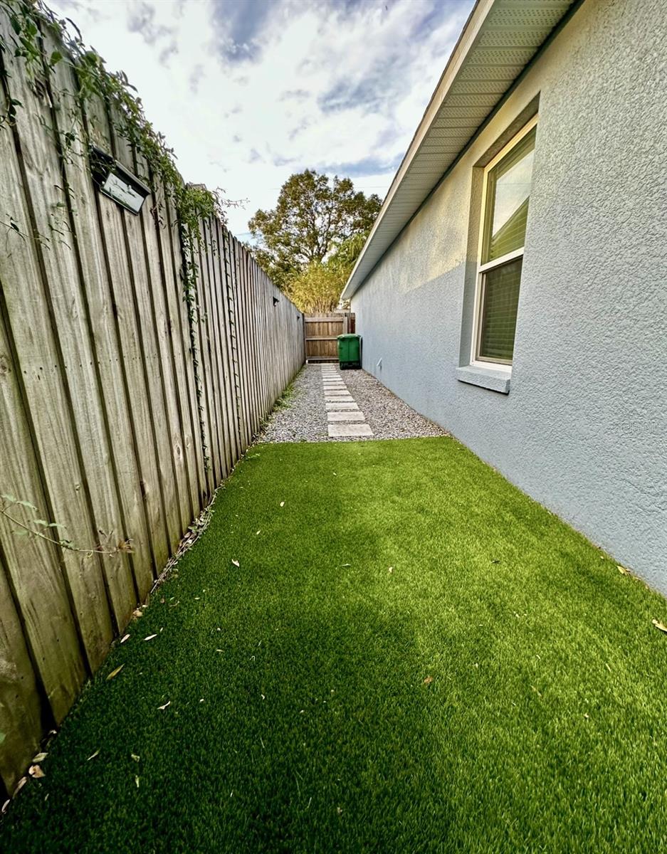 Turf Side Yard and Gravel Paver Pathway