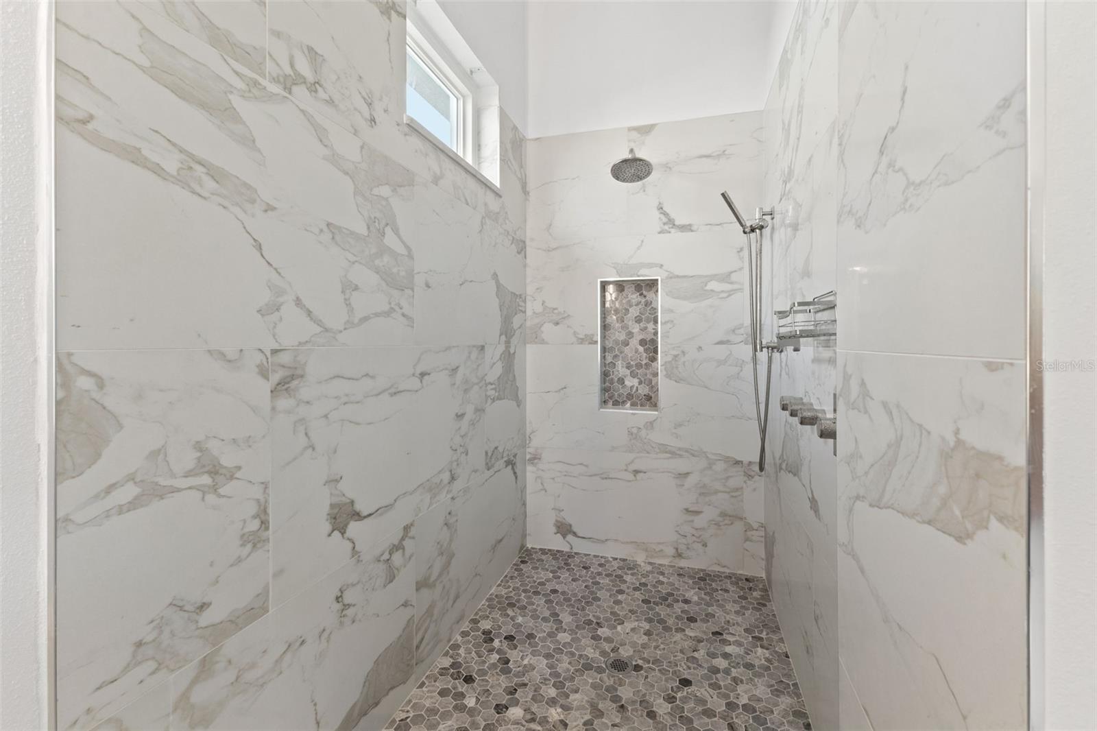 Beautiful large walk in shower in primary bathroom