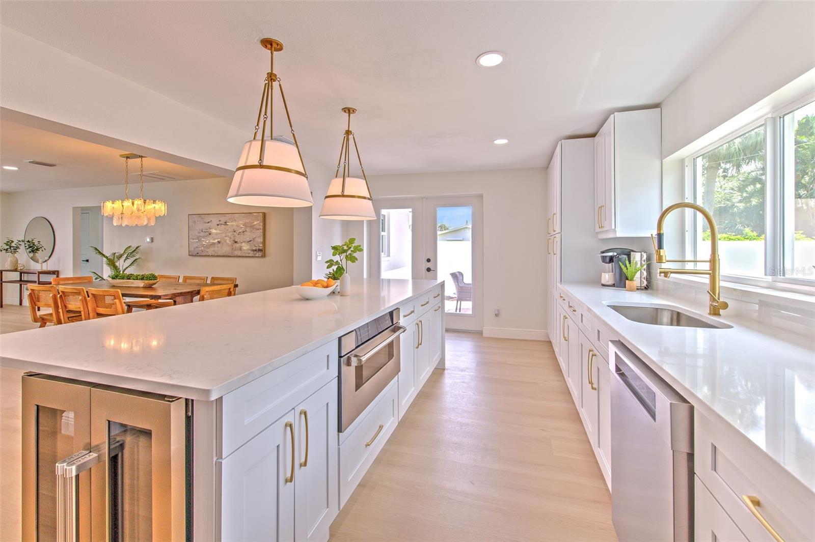 Kitchen overlooks Great Room and Dining Area