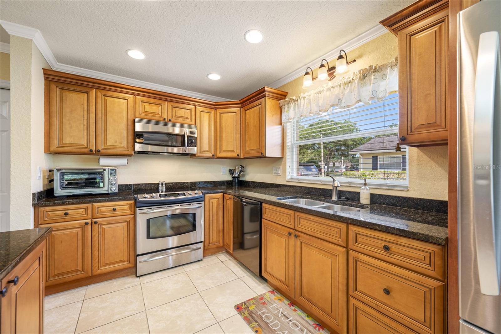 Kitchen with hard wood cabinets