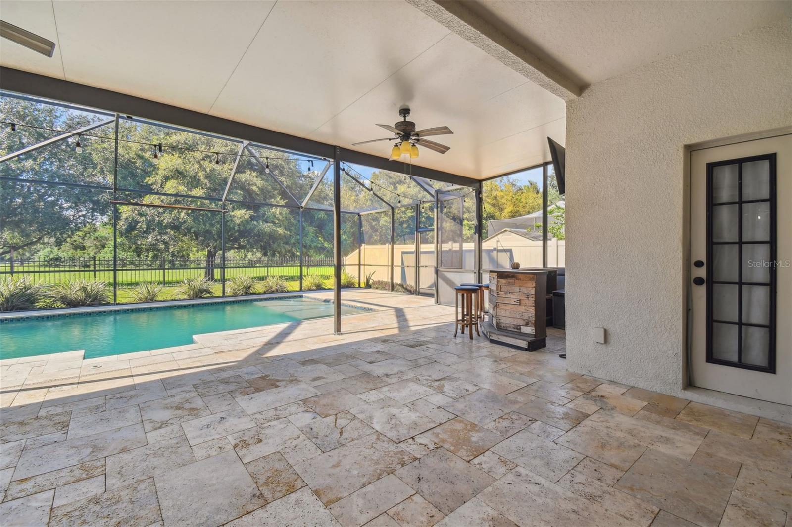 pool lanai with travertine