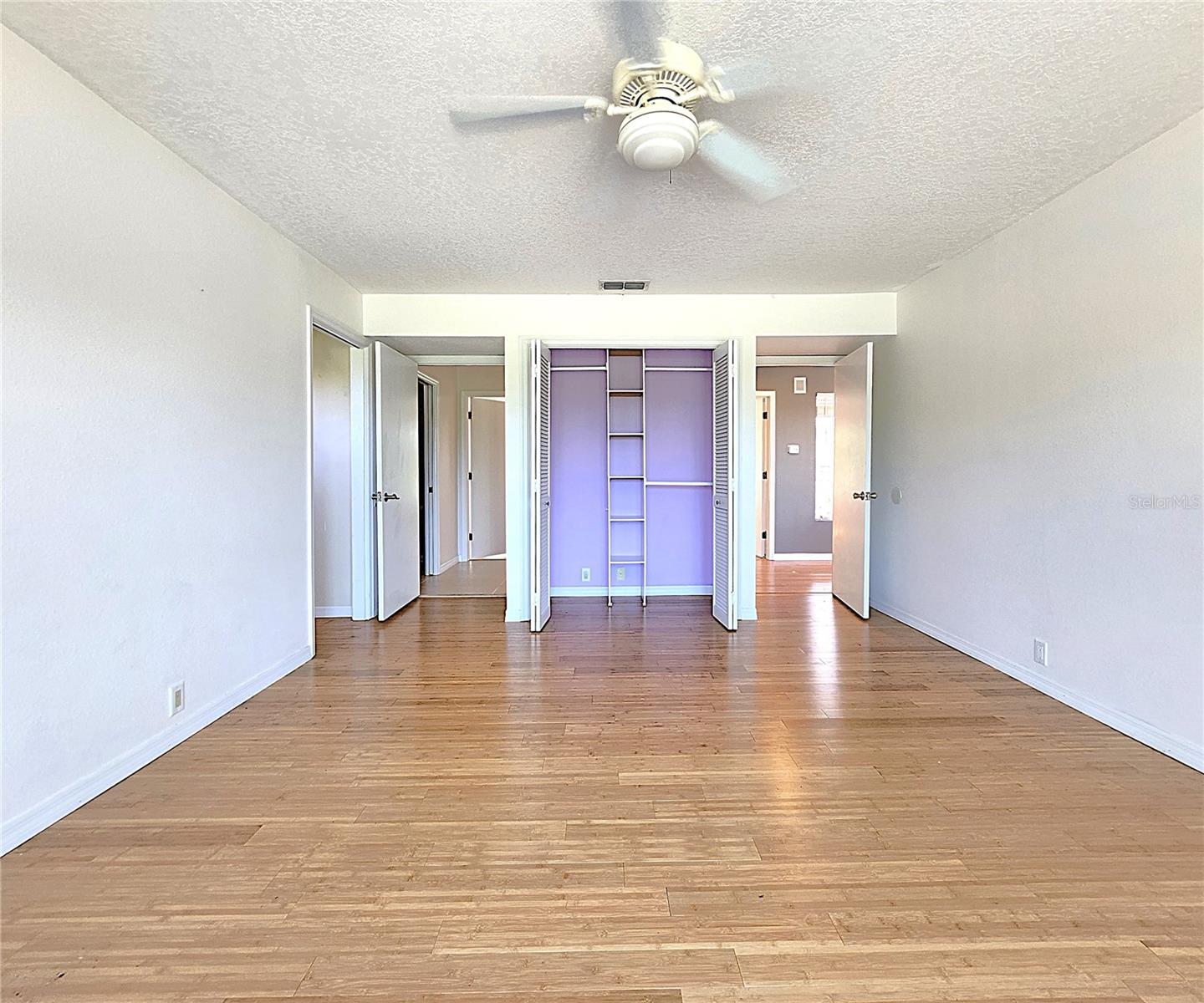 Third Bedroom on the upper level includes two closets: built in and walk-in