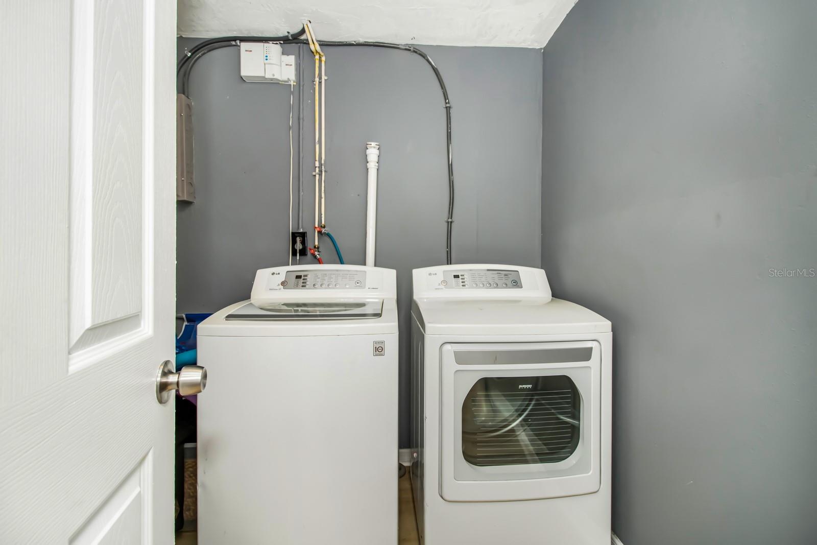 Inside Laundry Room with Washer and Dryer