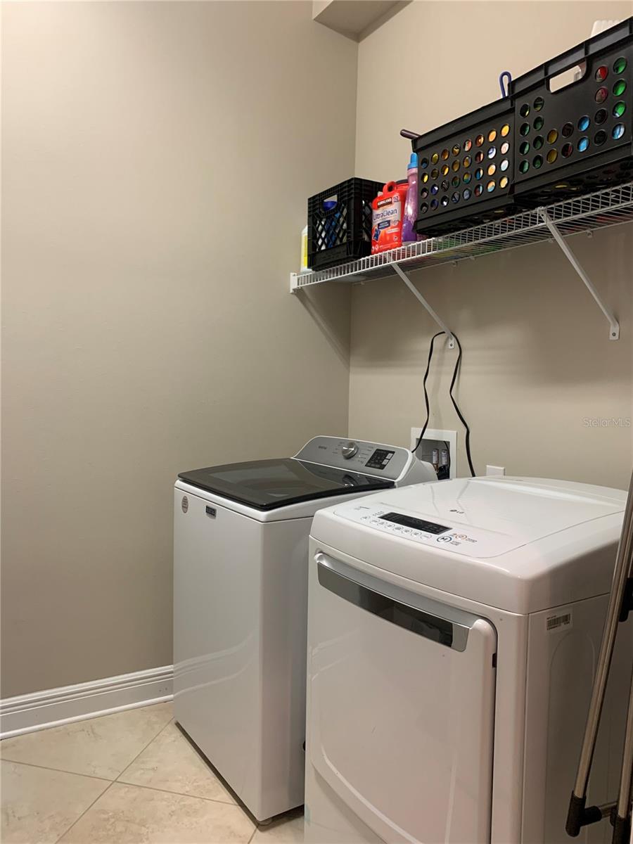 Laundry room w/ folding table