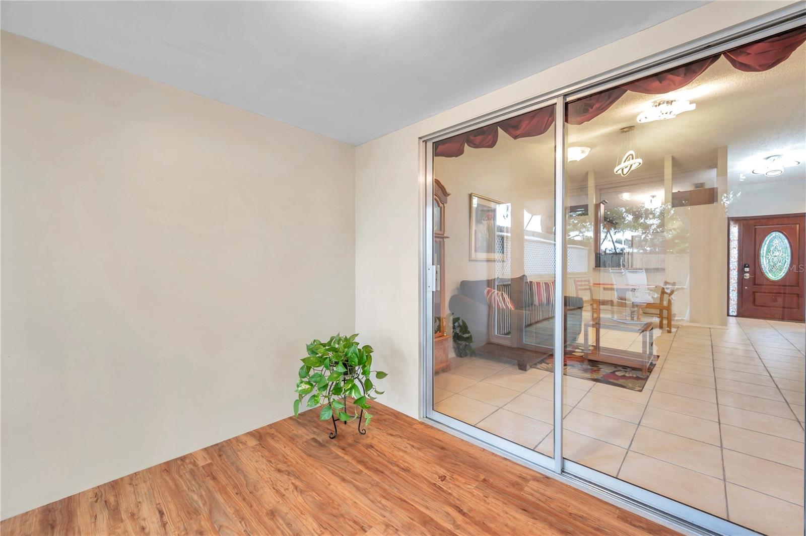 Patio inside House looking at Front Door