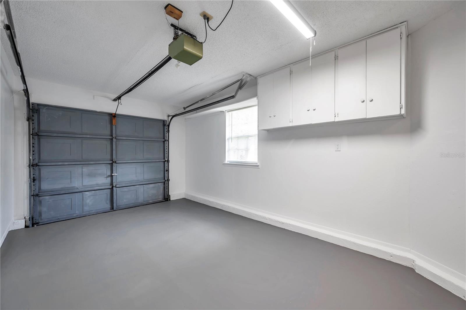 Garage with Cabinets on Wall