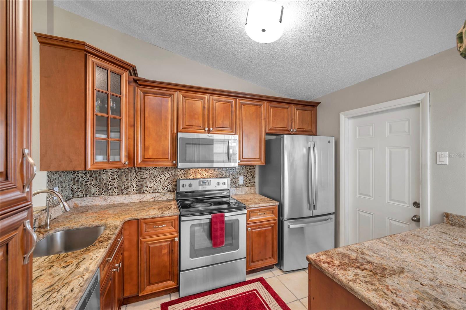 Beautiful Kitchen with Door to Garage