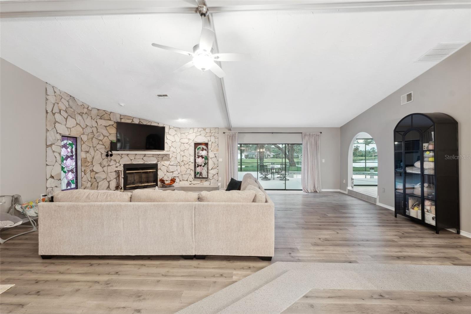 Step down from formal dining room into living room