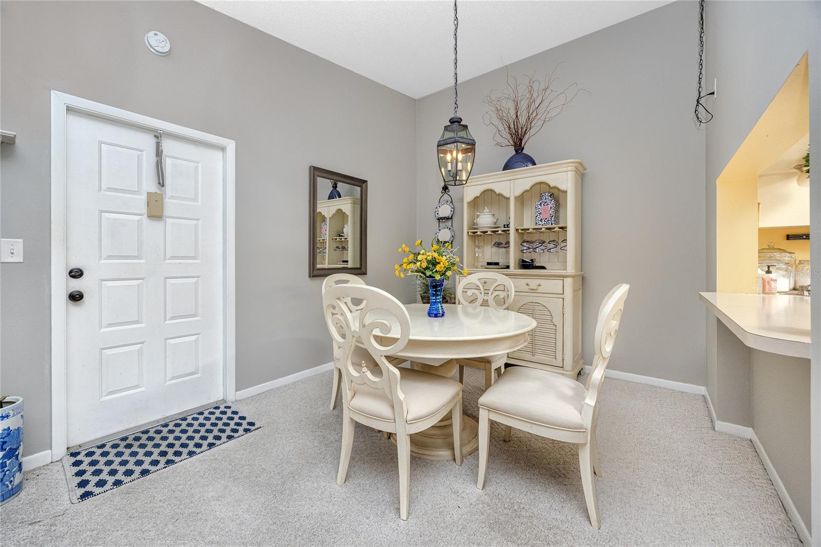 Front door and dining room