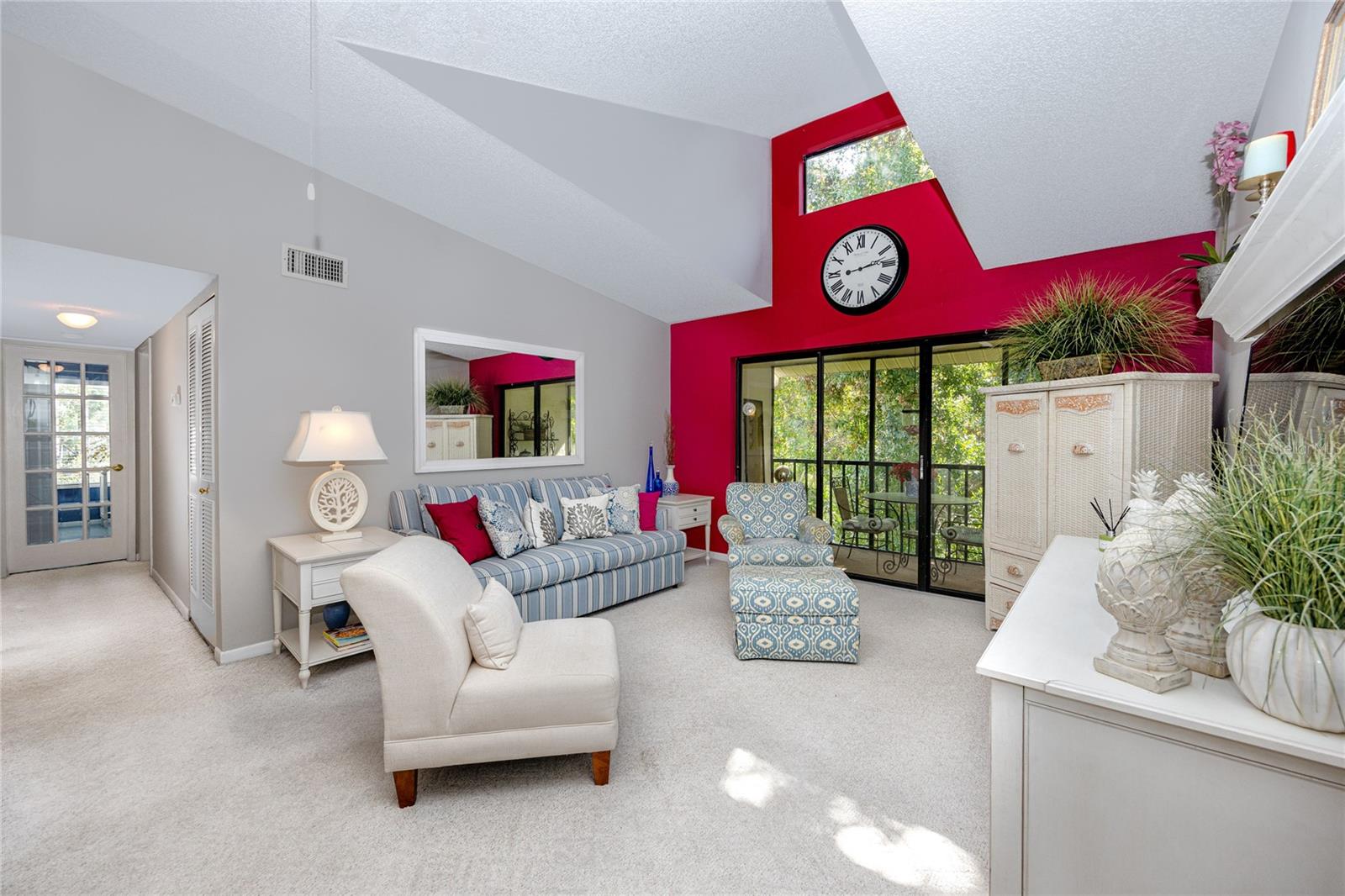 Living room with vaulted ceiling