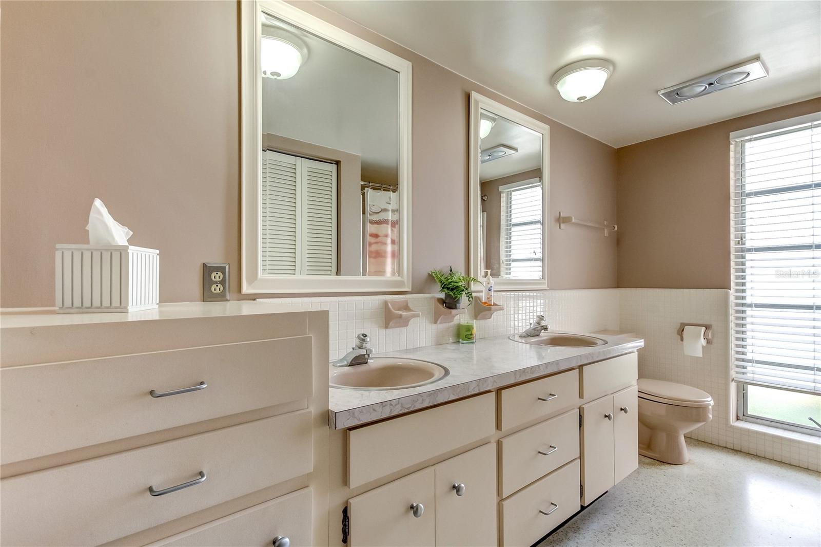 Hall Bathroom with built ins and dual sinks