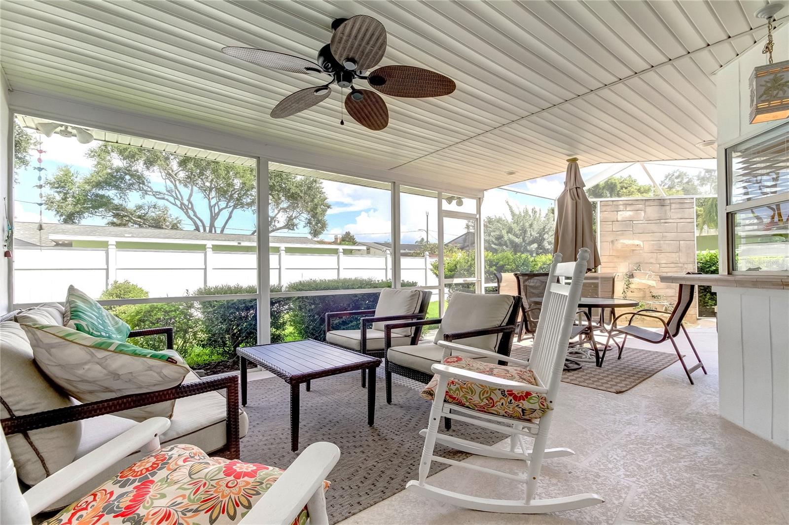 Covered, screened back patio