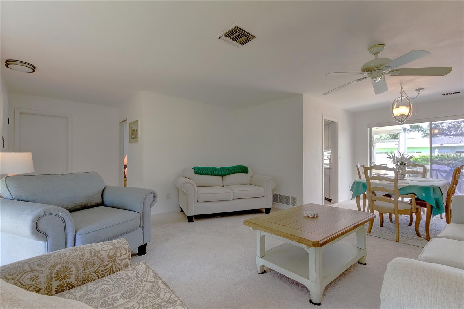 Formal living center looking into formal dining room