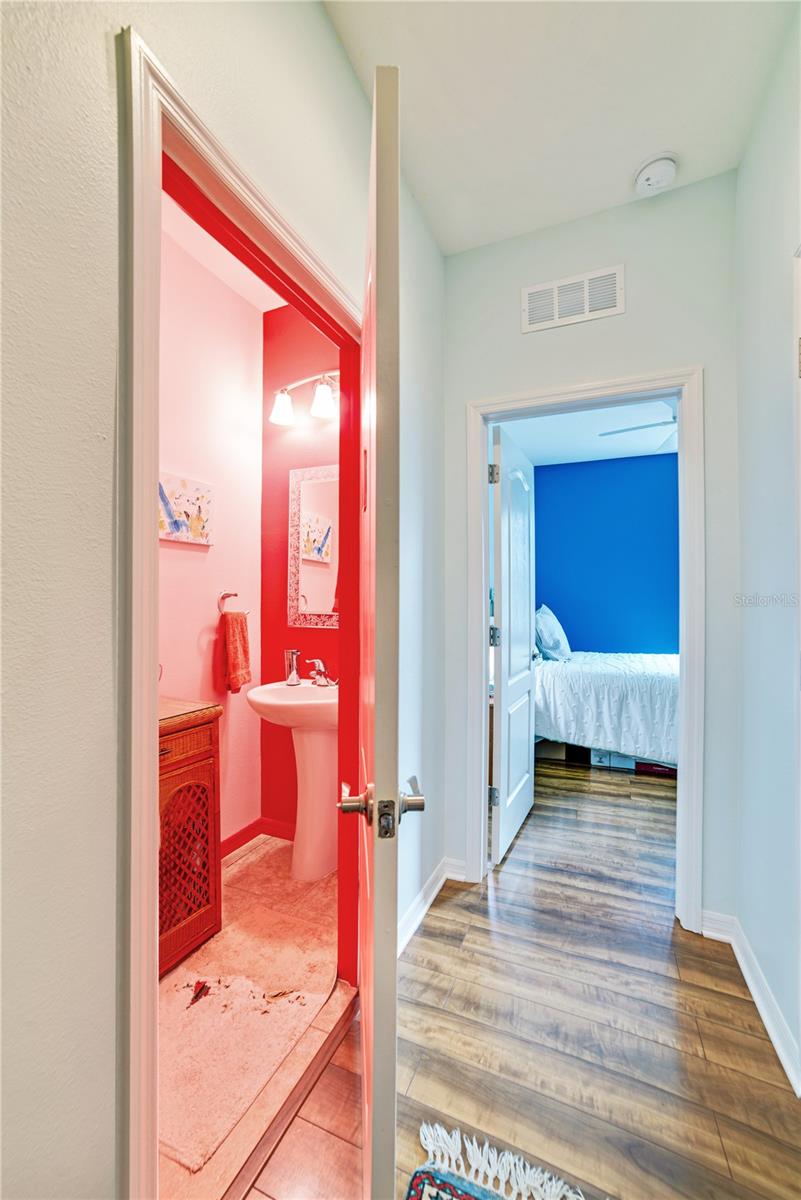 HALLWAY TO BEDROOM 2 AND POWDER ROOM