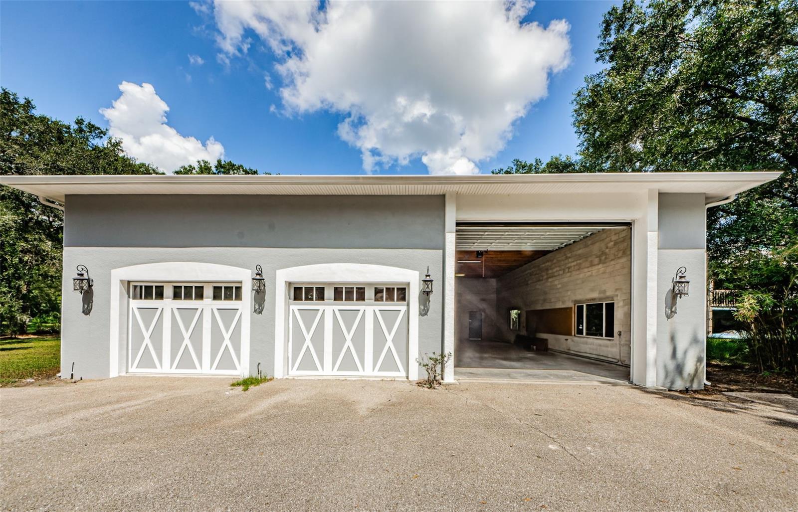 Every Car/boat/toy persons Dream Garage!! Room for a lift, or park your RV, Boat, or other toys! Workshop area. Garage also includes a large AC'd office and a Storage closet  Upstairs is the possibility for a studio apartment/ Man Cave