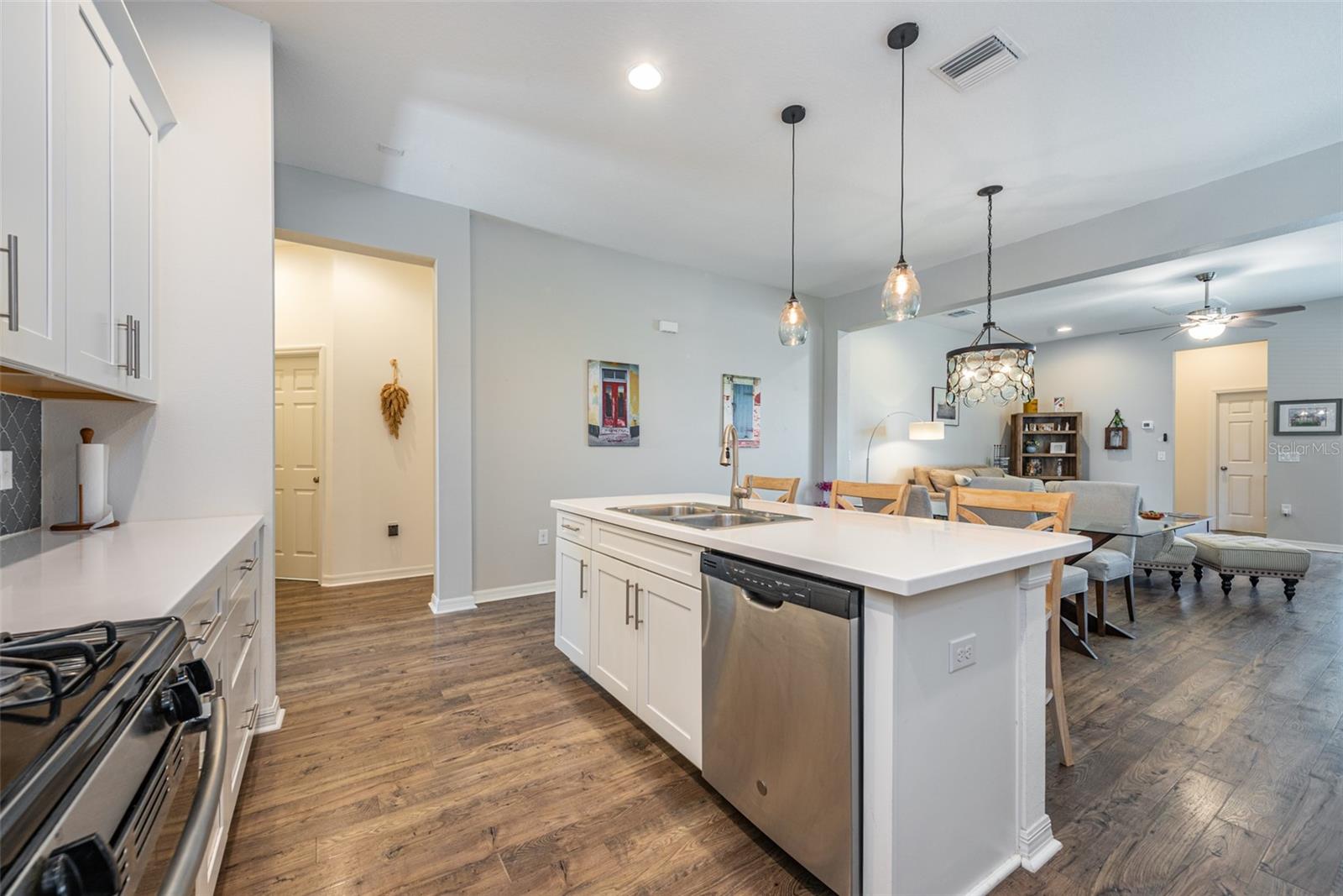 Seamless connection to dining and Living rooms from Kitchen.