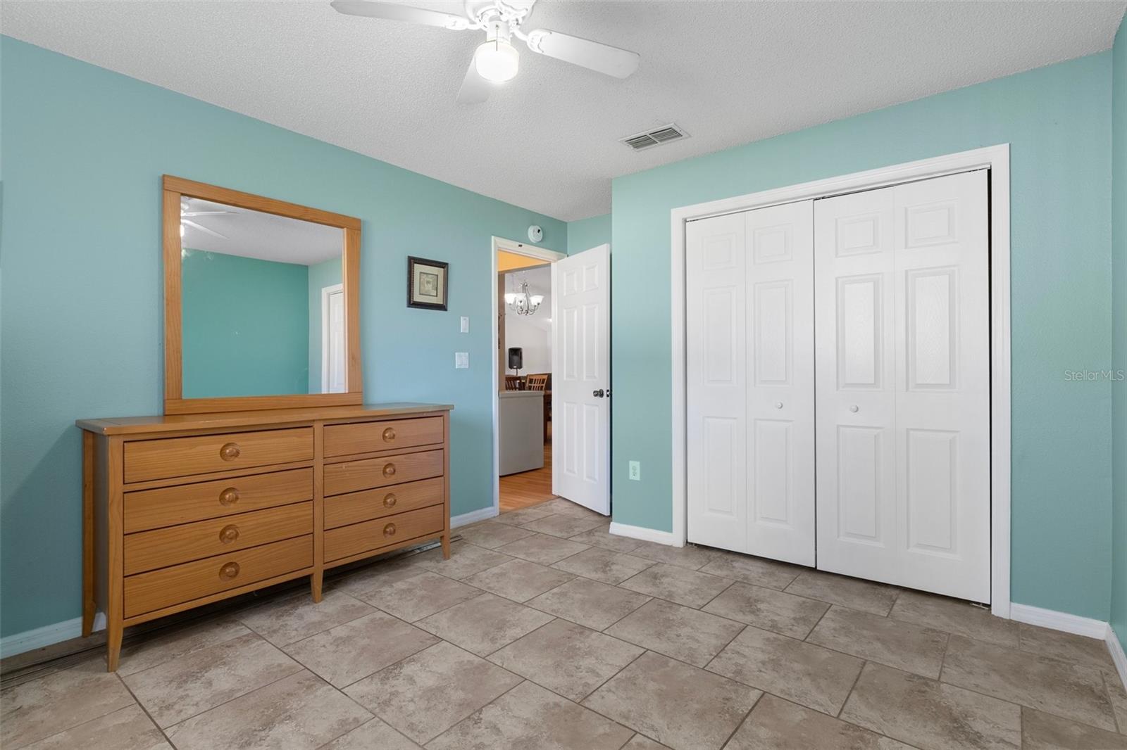 Bedroom four on the left and the guest bath/pool bath is on the right