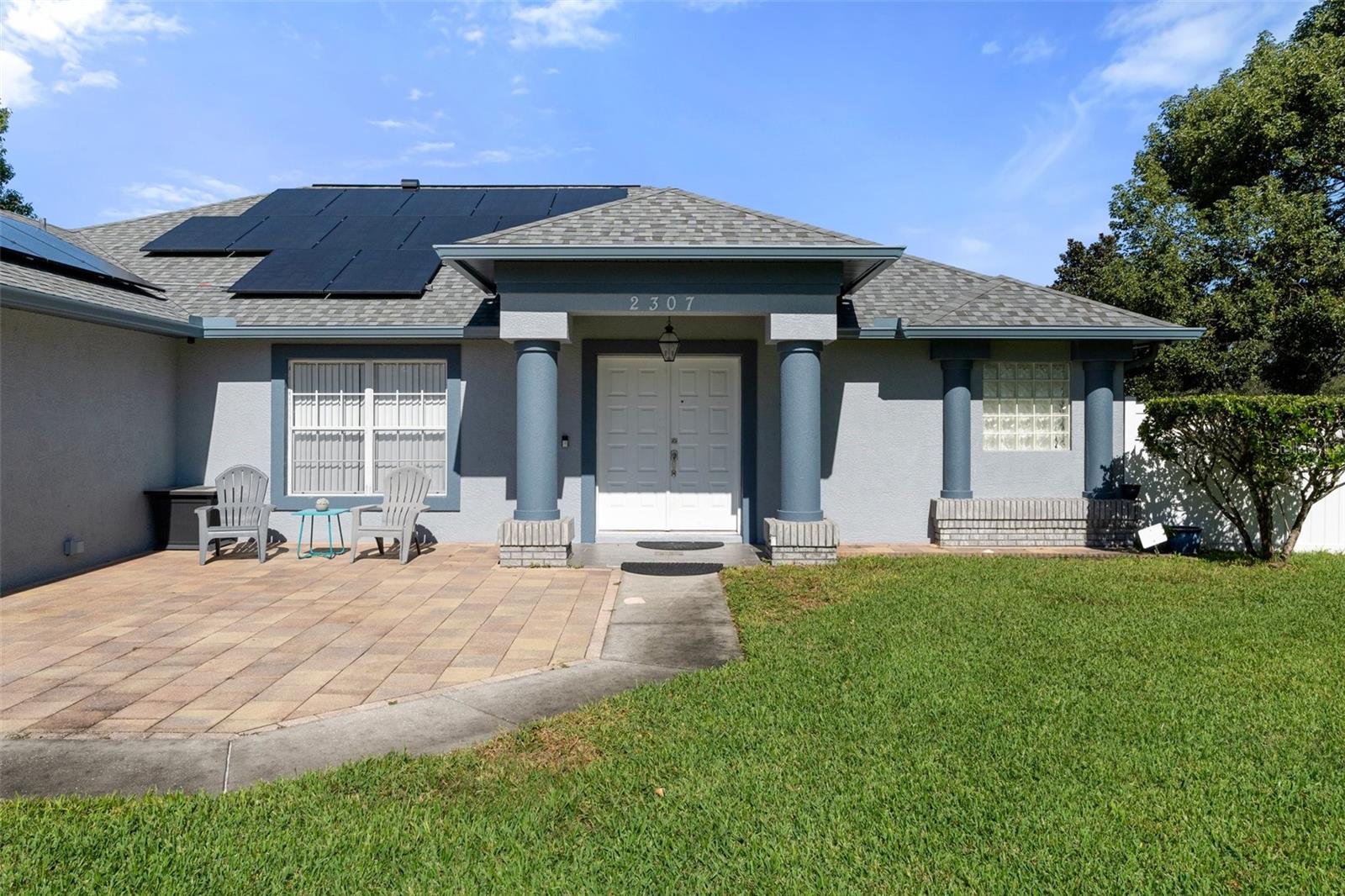 There is a Gorgeous Paver Patio in the front of the home