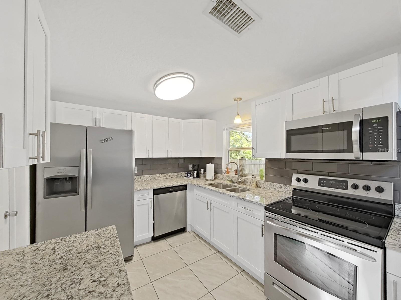 Kitchen with granite counters