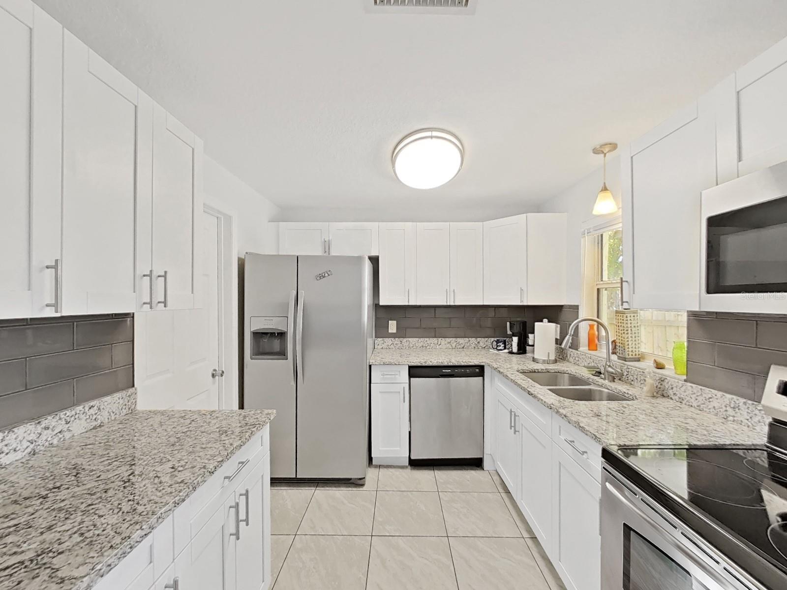 Kitchen with all stainless appliances