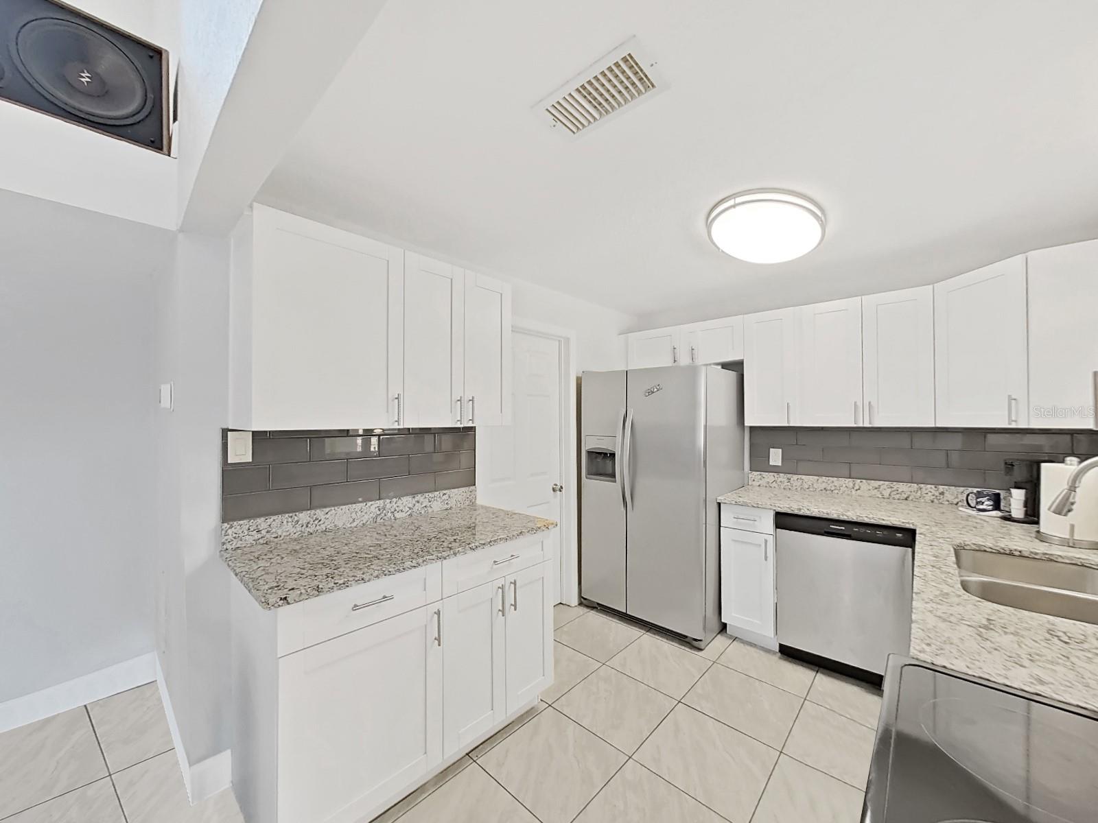 Kitchen with tile backsplash