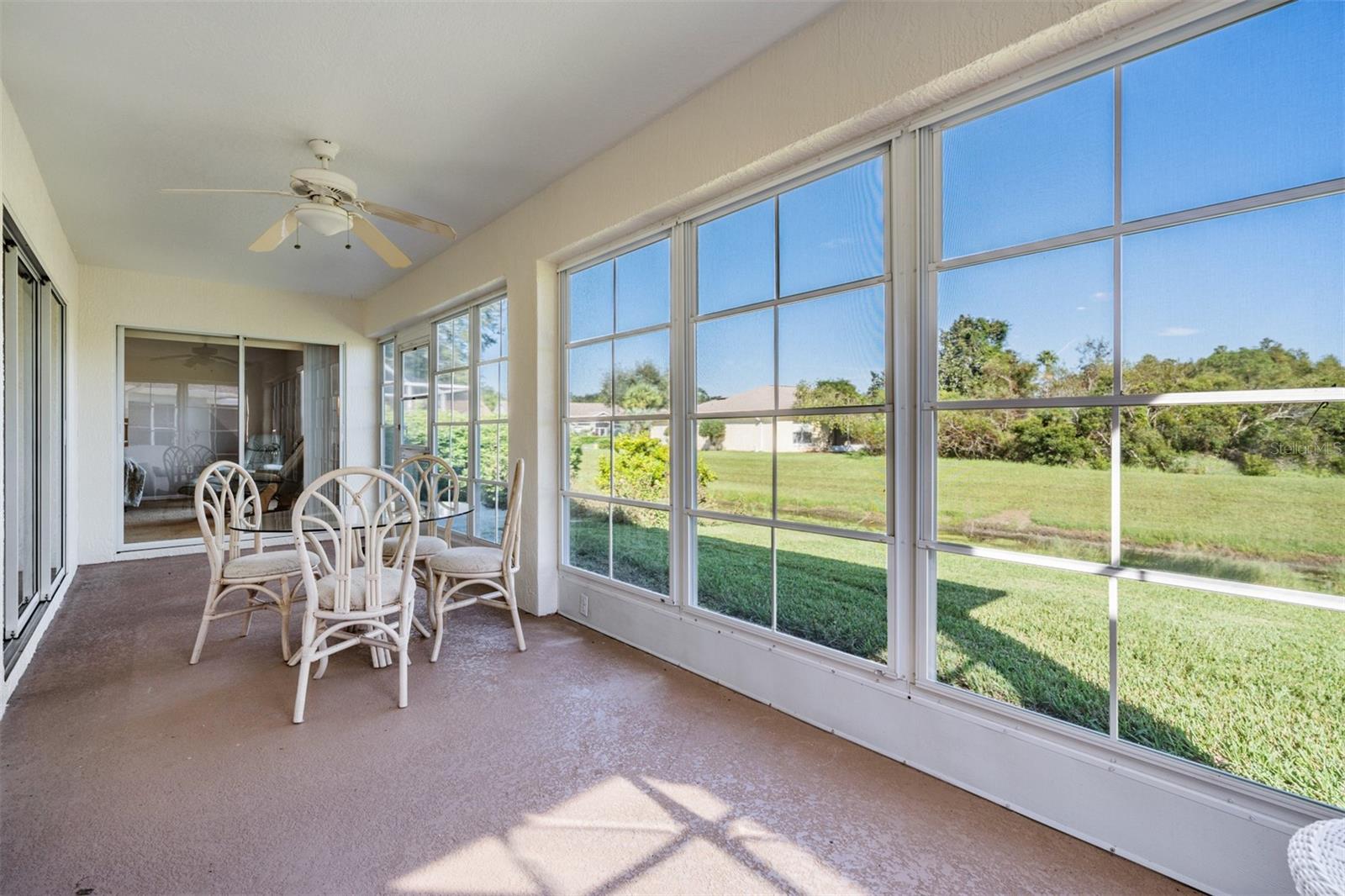 Large Enclosed Florida Room with Painted floor