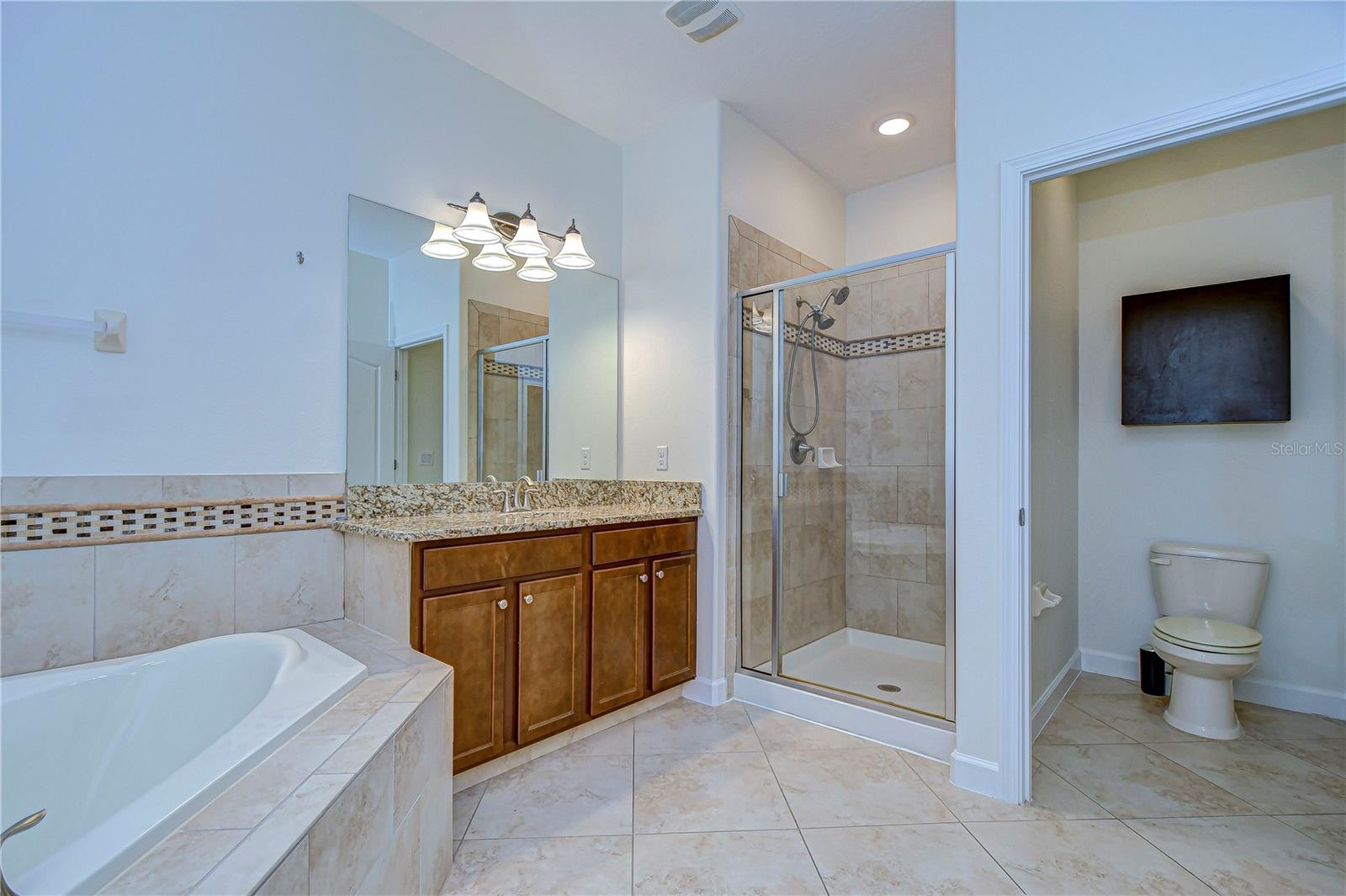 Dual sinks, a separate soaking tub and walk in shower!