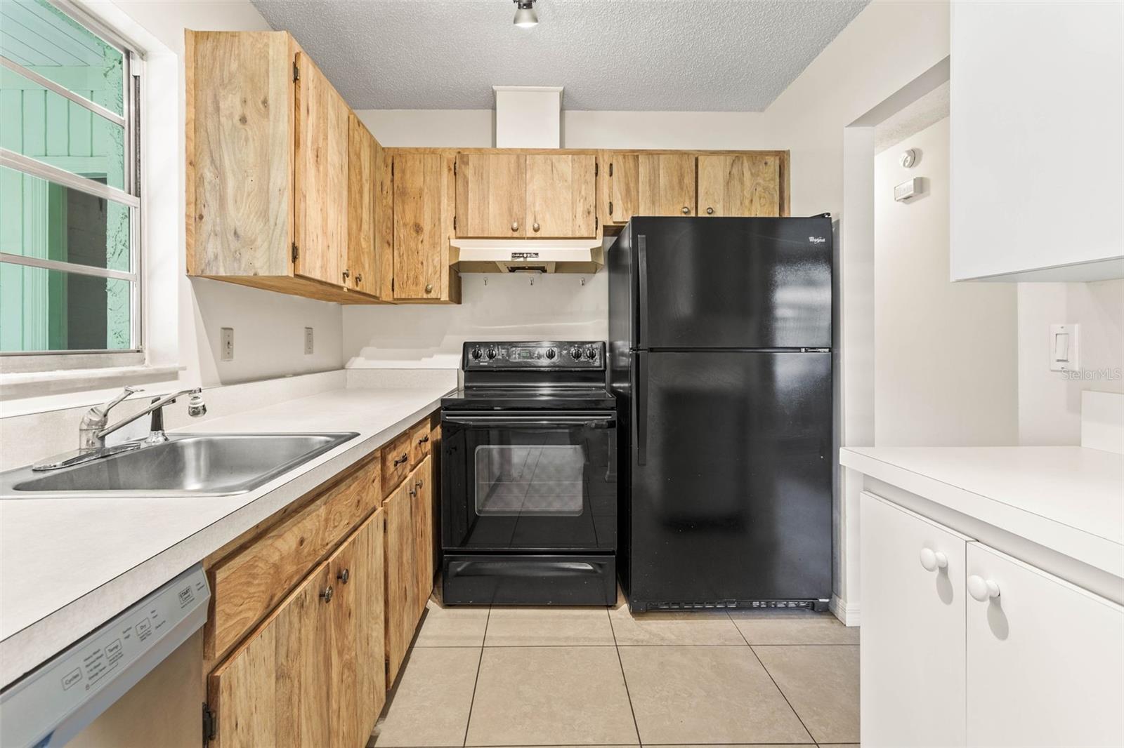 Kitchen with ample storage and countertops