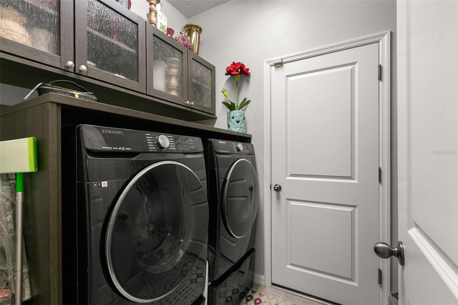 Laundry Room with Custom Cabinets