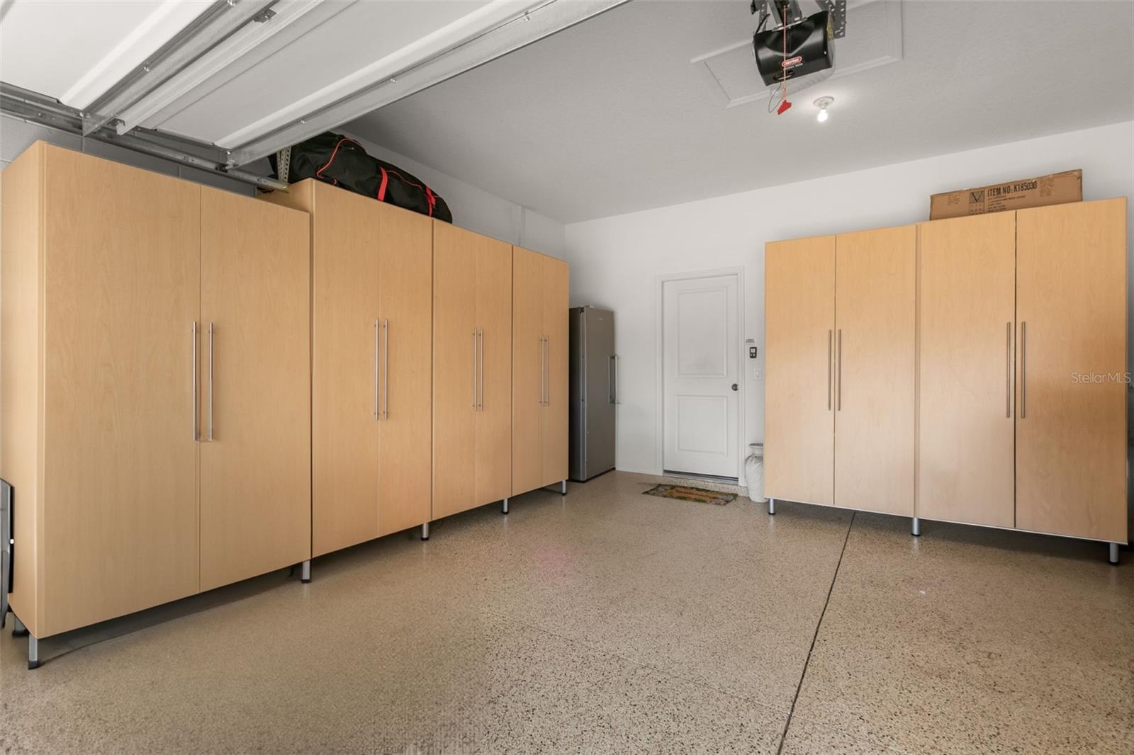 Two Car Garage with Custom Storage Cabinets