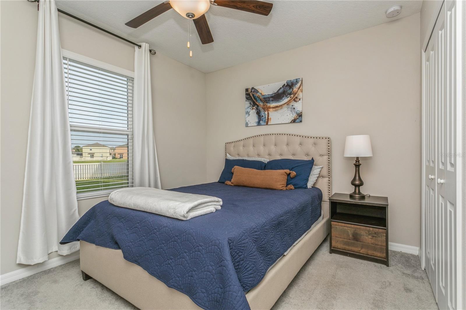 Lake Water View- downstairs guest bedroom