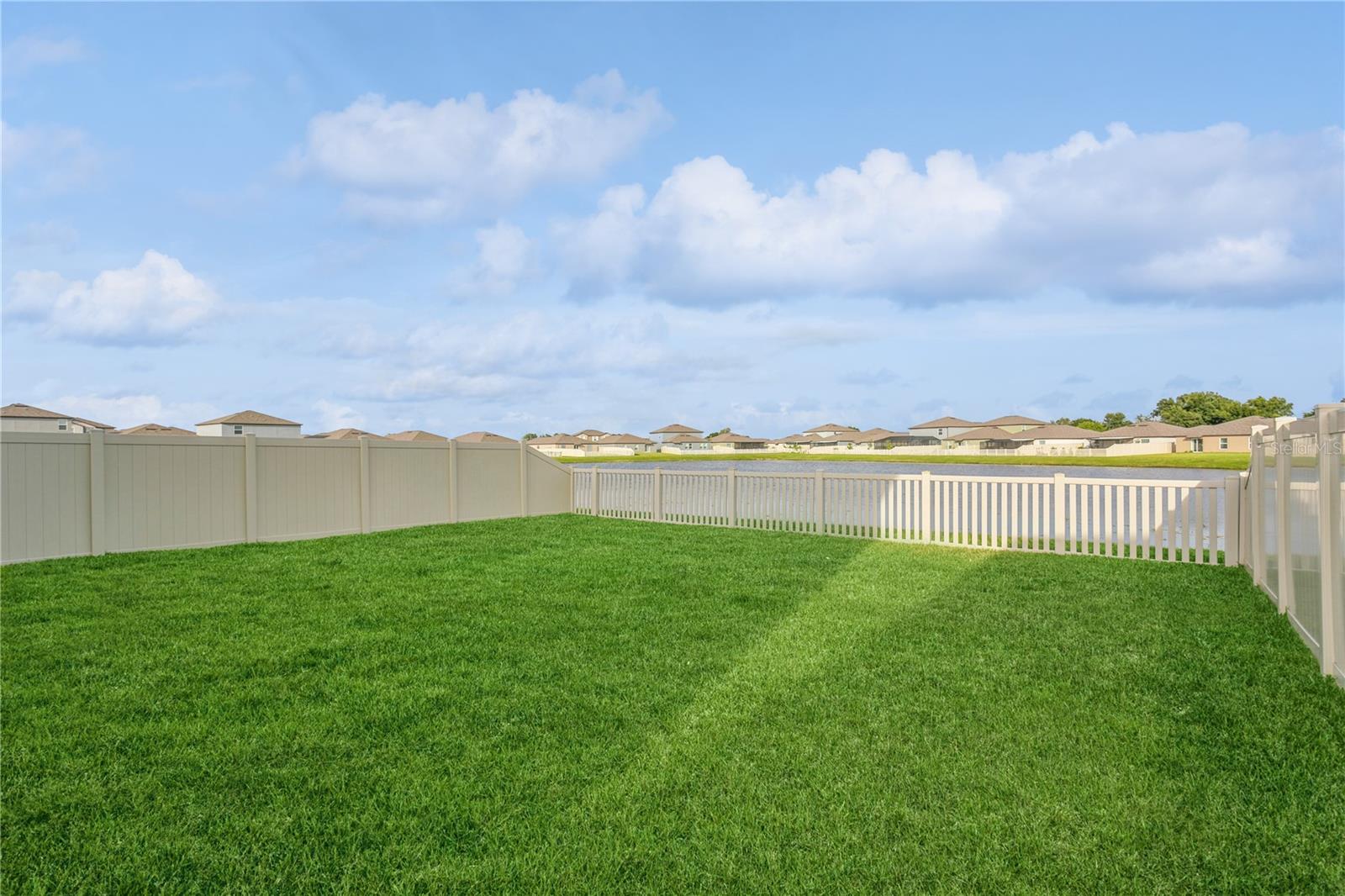 Large Fenced-In Lake Front Backyard