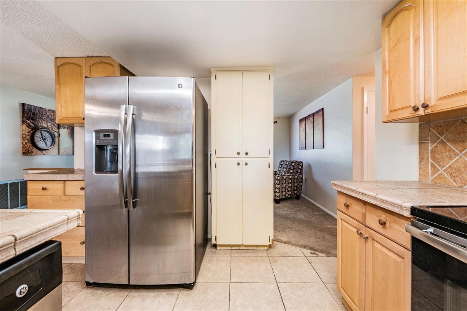 Big pantry here and more pantry space at eat-in kitchen area!  All STAINLESS STEEL appliances included!