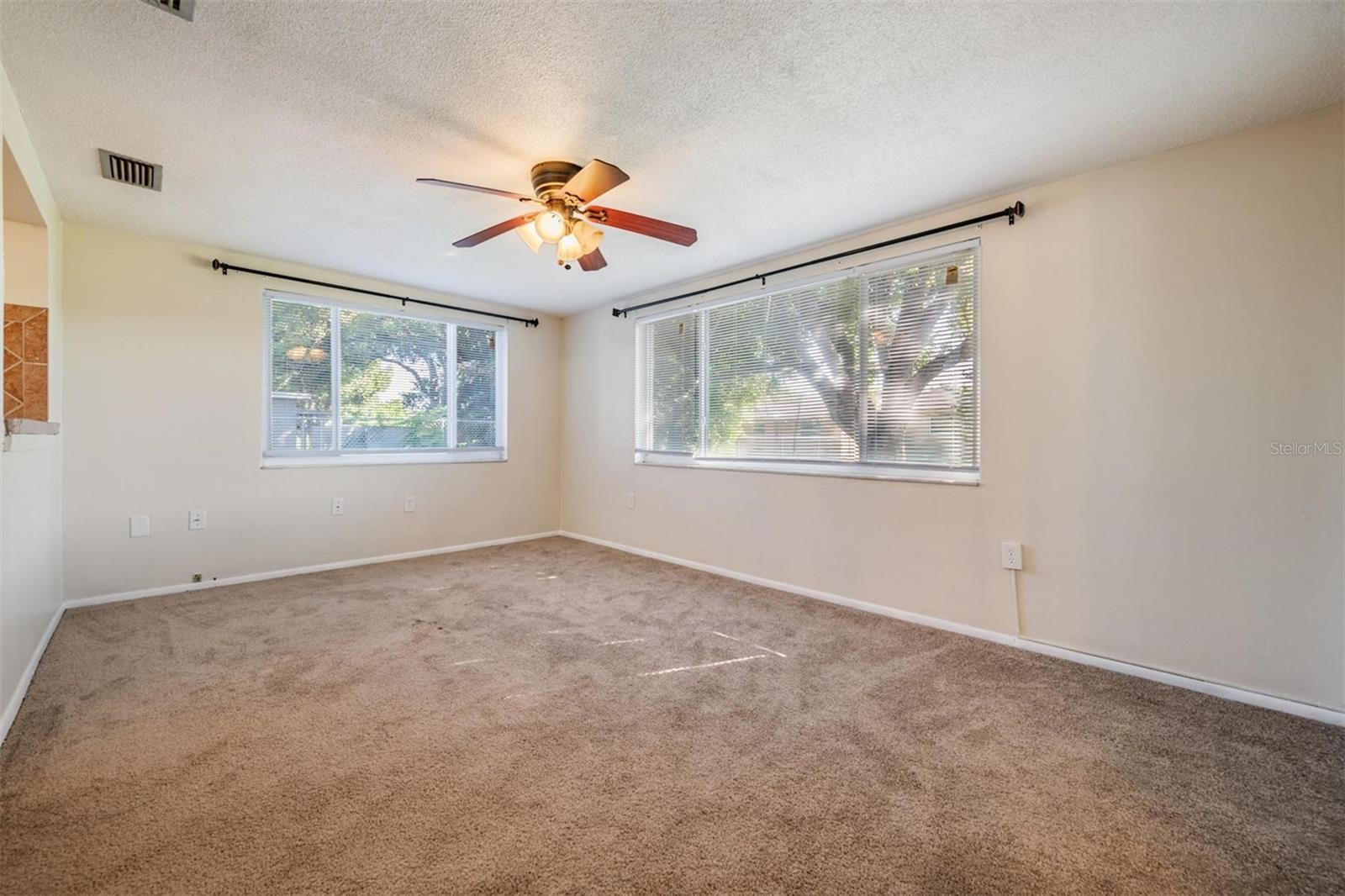 Notice EVERY ROOM has ceiling fans? Even the kitchen!  (Love!)